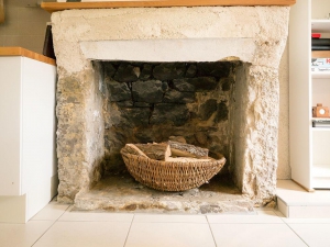 Ferienhaus - Kamin im Küchenbereich