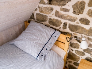Ferienhaus - Bett (Detail)